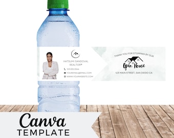 May include: A clear plastic water bottle with a green cap and a white label. The label has a photo of a woman, the text "Hatsumi Sandoval Realtor®", a phone number, an email address, and a website address. The label also has the text "Thank you for stopping by our Open House 123 Main Street, San Diego CA".
