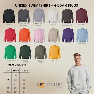 Puede incluir: Imagen de sudaderas unisex Gildan 18000 en varios colores, como negro, blanco y rojo. Tambi&eacute;n se muestra una tabla de tallas con medidas en cent&iacute;metros. La marca "MOTHERHAND ART" es visible.