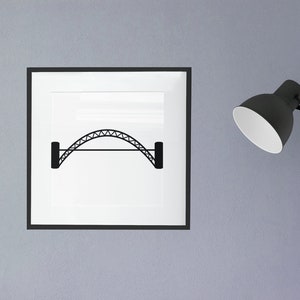 May include: A square wall art print featuring a black graphic illustration of an arched bridge with a truss design. The artwork is encased in a thin black frame, presenting a clean and high-contrast visual of the bridge structure on a white background.