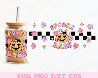 May include: A 16oz glass can wrap featuring a pink and orange pumpkin with the text "Spooky Babe" in a retro font. The design includes a checkered pattern and pink flowers.
