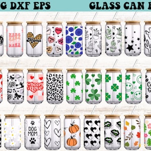 May include: A set of 20 glass can designs featuring various patterns and graphics. The designs include hearts, stars, flowers, animals, and text. The cans are all clear glass with a wooden lid and a straw.