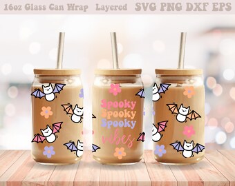 May include: A set of three 16-ounce glass can wraps with a spooky theme. The wraps feature bats, flowers, and the text "Spooky Spooky Spooky Vibes".