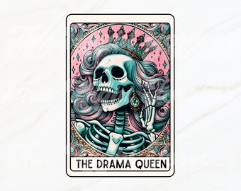 May include: A digital illustration of a skeleton wearing a crown and pink hair. The skeleton is holding up a peace sign. The image is in a tarot card style frame with the text "THE DRAMA QUEEN".