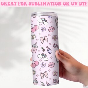 May include: A pink stainless steel tumbler with a pattern of cherries, bows, lips, flowers, rainbows, and sunglasses.