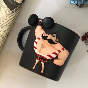 Mug with handmade figure