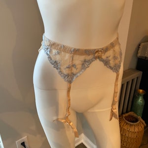 Vintage Lingerie Victorias Secret garter belt sz Small blue and tan color