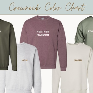 May include: Color chart for crewneck sweatshirts. The colors are: Military Green, Heather Maroon, Stonewashed Green, Ash, and Sand.
