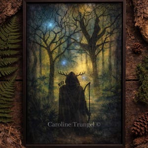 May include: A framed art print depicting a hooded figure with antlers, holding a bow and arrow, in a mystical forest setting. The artwork features a dark color palette with a touch of yellow and blue, and the artist's name, Caroline Trungel, is visible.
