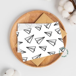 Postal con aviones de papel