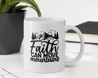 May include: White ceramic mug featuring a black mountain scene and the text "Faith can move mountains".