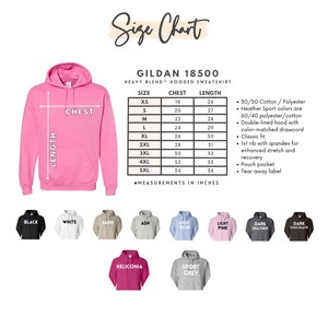 May include: A pink hooded sweatshirt with a size chart and color options. The size chart shows chest and length measurements in inches. Available colors include black, white, sand, ash, light blue, light pink, dark heather, dark chocolate, heliconia, and sport grey.