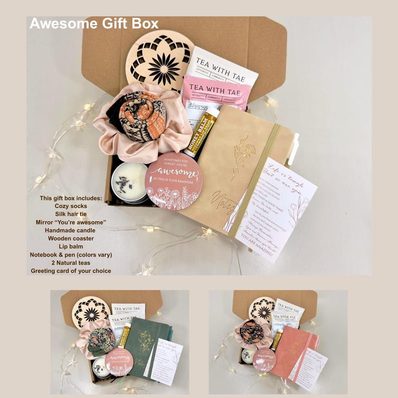 May include: An open gift box filled with self-care items. The box contains a candle, notebook, lip balm, tea, and a mirror with the text "You're awesome". The box also includes a wooden coaster and a silk hair tie. The text "Awesome Gift Box" is at the top.