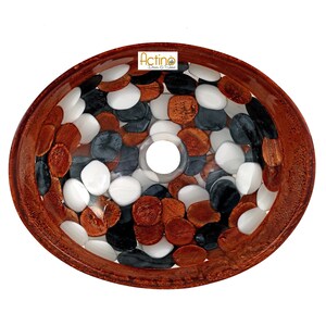 May include: Oval-shaped sink with a brown rim and a clear resin interior. The sink is decorated with white, black, and copper-colored pebbles.