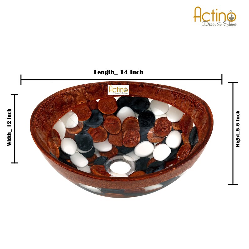 May include: A brown and white resin bathroom sink with a pebble design. The sink is 14 inches long, 12 inches wide, and 5.5 inches high.