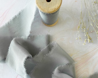 Silk Ribbon In Grey | 5 Meter Roll of 50mm wide Habotai Silk Ribbon with a raw edge | Silk Ribbon on a wooden Spool | Silver Grey