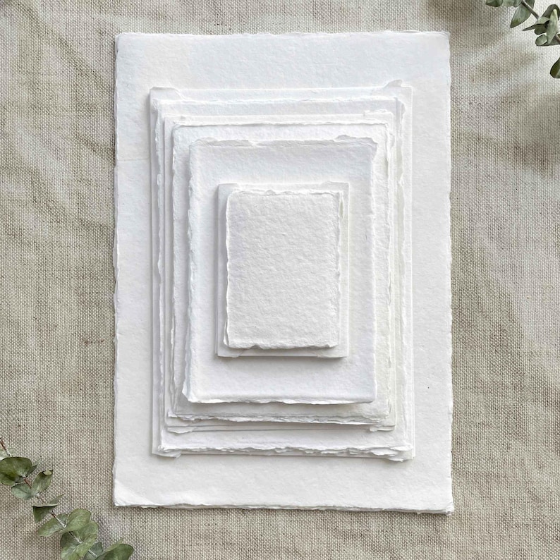 White handmade cotton rag paper and card with deckled edges in various sizes