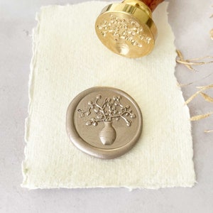 wax stamp with a vase and flowers.  Pretty wax seal for decorating wedding stationery, invitations, gift wrapping and more