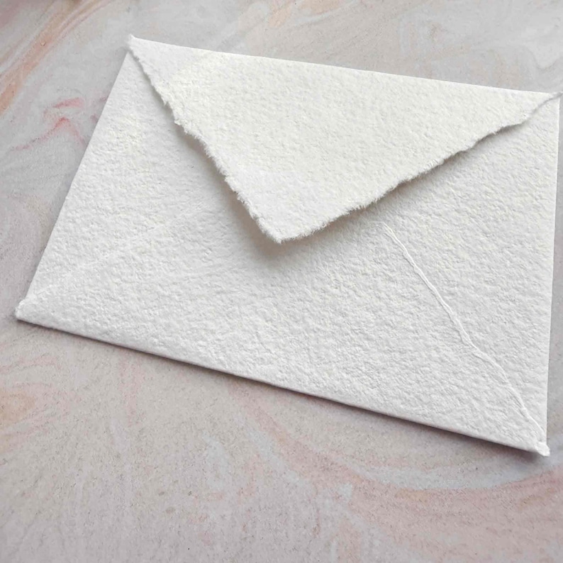 handmade cotton paper envelopes with deckled edges and pointed flap