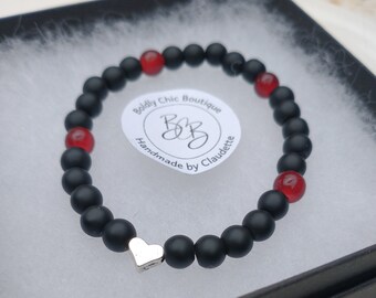 Black steel heart charm bracelet with ruby red accent beads