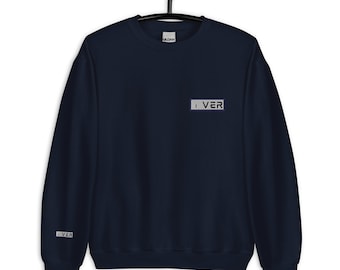 May include: A navy blue sweatshirt with a white rectangle on the chest that says "I VER" in gray text. The same text is also on the left sleeve.