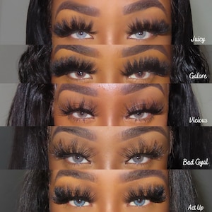 Op de afbeelding: Vijf verschillende paar valse wimpers worden getoond op een model met blauwe contactlenzen. De wimpers zijn gelabeld met "Juicy", "Galore", "Vicious", "Bad Gyal" en "Act Up".
