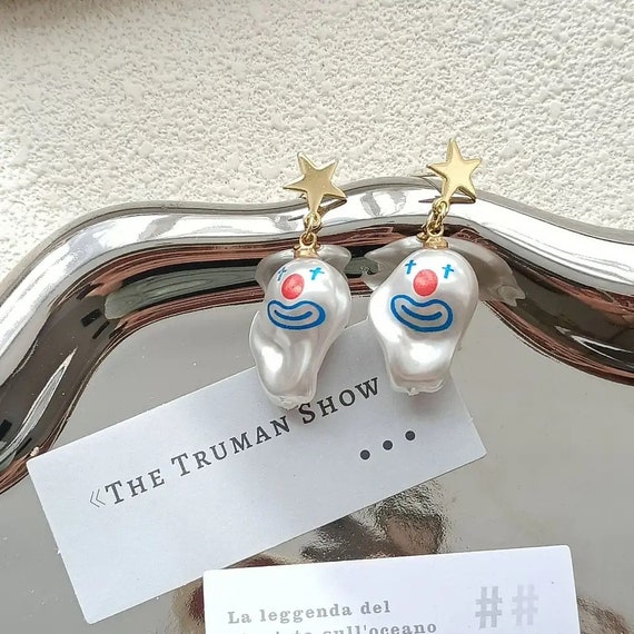 Clown pearl earrings deals