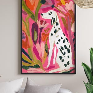 May include: A framed art print featuring a Dalmatian dog with black spots, set against a vibrant pink background with colorful floral and foliage elements. The artwork is enclosed in a black frame, adding a modern touch to the whimsical scene.