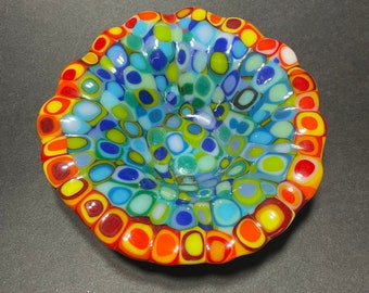 Colorful round bowl with a ruffled rim