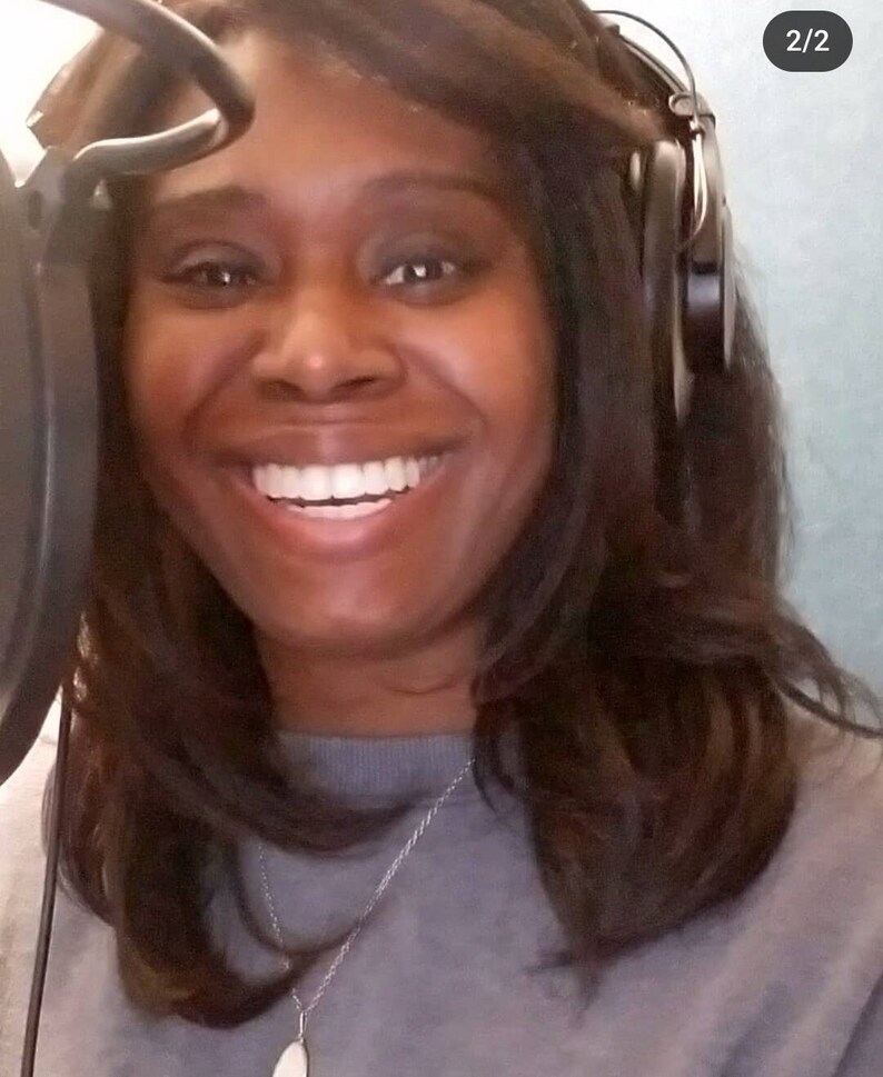 Picture of the seller: A smiling person with dark hair wearing a gray sweater and a silver necklace with a pendant. The person is wearing headphones and is positioned in front of a microphone. Audio Astrology Chart Reading Personalized Audiobook Gift, Astrology Reading, Birth Chart Print, Natal Chart Reading, Zodiac Spiritual Gifts. natal chart reading, astrology chart reading, birth chart print