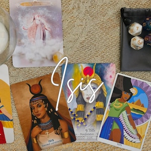 May include: An overhead shot of tarot cards with Egyptian-themed illustrations, dice, a candle, and crystals. The word "Isis" is written across the cards. The cards feature images of women and the words "Strength" and "Sacred contracts".