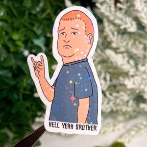 Tristement rock on Bobby autocollant en vinyle holographique | Enfer ouais frère | Sticker pour ordinateur portable | Sticker Holographique Imperméable | Sticker pour verres
