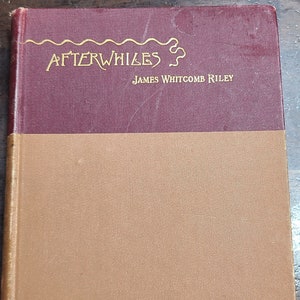 May include: A burgundy hardcover book with gold lettering on the front cover. The title is "Afterwhiles" by James Whitcomb Riley.