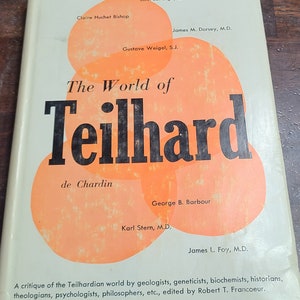 May include: Book cover with an orange background and the title "The World of Teilhard de Chardin". The cover features a Venn diagram with the names of several authors, including John Lafarge, Claire Huchet Bishop, James M. Dorsey, Gustave Weigel, George B. Barbour, Karl Stern, and James L. Foy.