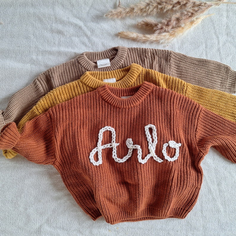 Cute Custom Baby Sweaters: Personalize Their Name with Stunning Embroidery image 1