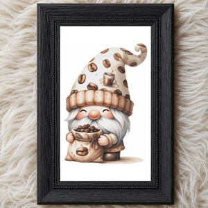 May include: A framed print featuring a gnome with a white beard and a tan hat decorated with coffee bean patterns and a small cup illustration. The gnome holds a tan sack filled with dark brown coffee beans, set against a white background.
