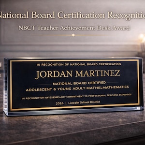 May include: A rectangular desk award with a black and gold design. The award features the name "JORDAN MARTINEZ" in gold lettering. The text also includes "National Board Certified" and "Adolescent & Young Adult MathelMathematics."