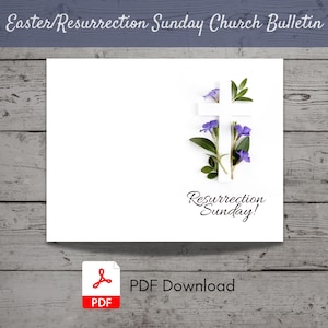 Könnte beinhalten: Eine weiße Karte mit einem ausgeschnittenen weißen Kreuz. Das Kreuz ist mit lila Blumen und grünen Blättern verziert. Der Text "Resurrection Sunday!" steht unter dem Kreuz.