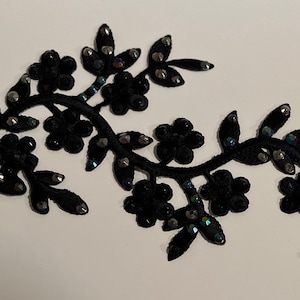 Large black hand-rhinestoned appliqué for dance costumes