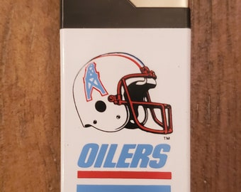 Vintage HOUSTON OILERS lighter!!