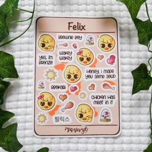 May include: A sticker sheet featuring various cartoon images and text. The stickers include a yellow chick with a pink bow, hearts, food, and phrases like "Brownie Boy" and "Honey, I made you some soup."