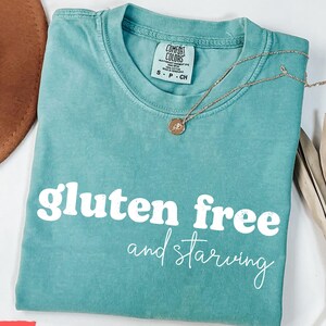 Gluten Free And Starving T Shirt, Funny Comfort Colors Tee, Humorous Graphic Shirt, Celiac Awareness Gift, Foodie Gluten Free Lifestyle Top, gluten free tshirt, funny gluten free tee, celiac awareness shirt, comfort colors funny, foodie graphic shirt, gluten free lifestyle, humorous comfort tee, gluten free gift top, funny celiac shirt, comfort colors tshirt, gluten free graphic tee, food humor tshirt, gluten sensitive shirt
