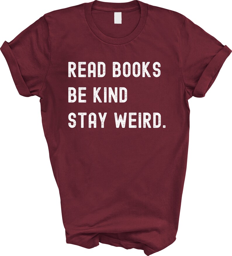 May include: Burgundy t-shirt with white text that reads "Read Books Be Kind Stay Weird."
