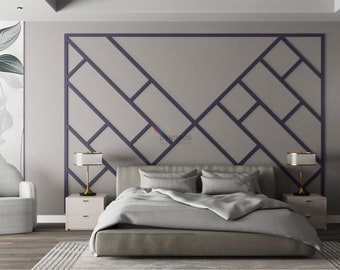 May include: A gray upholstered bed with a white duvet and pillows. The headboard is a gray wall with a geometric pattern of dark blue lines.