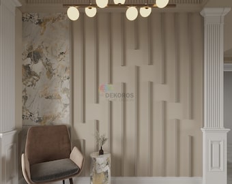 May include: A living room interior design with a brown armchair, a small round side table with a vase of dried flowers, and a decorative wall with a geometric pattern. The wall is painted in a light beige color and features a row of white globe lights.