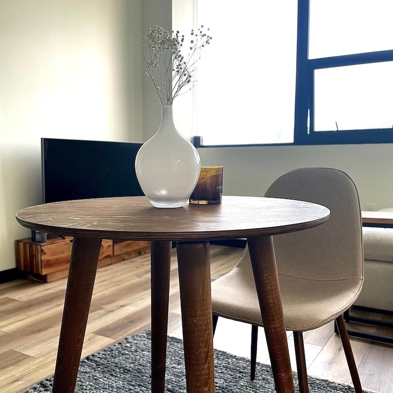 Here is Narrow Round Dining Room Table, perfect for maximizing space in your kitchen while adding a touch of natural beauty. Rustic style enhance your kitchen with our Small 2 Person Dining Table Walnut Wood