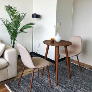 Here is Narrow Round Dining Room Table, perfect for maximizing space in your kitchen while adding a touch of natural beauty. Rustic style enhance your kitchen with our Small 2 Person Dining Table Walnut Wood