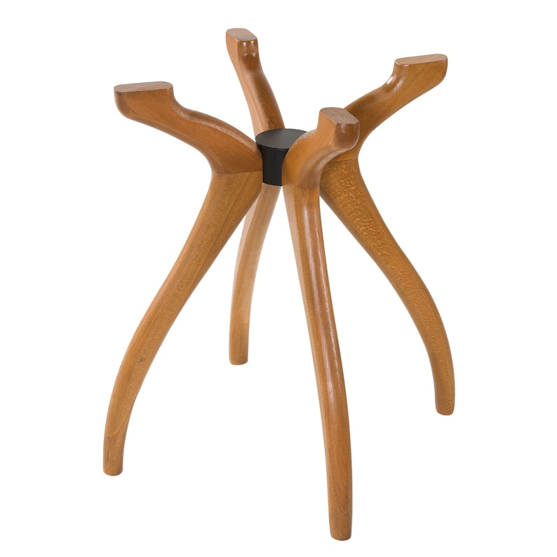 May include: A wooden table base with six curved legs. The legs are a light brown color and extend outwards from a central black circular support. The legs have a smooth, polished finish.