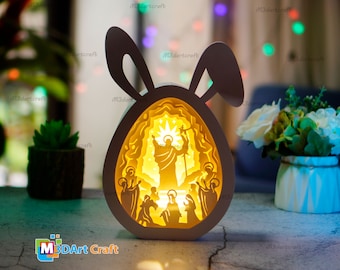Pasqua Gesù Cristo è risorto nell'uovo di Pasqua Shadow box PDF, modello SVG, Silhouette Studio per Cameo4, scatola luminosa di Pasqua in carta tagliata