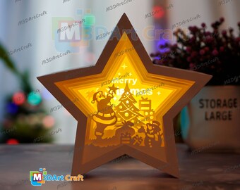 May include: A wooden star-shaped light-up Christmas decoration with a layered design. The design features a Santa Claus figure, a Christmas tree, and the words "Merry Christmas".