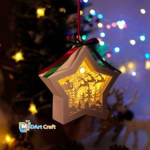 Modello SVG di scatola d'ombra lanterna stella appesa slitta di Babbo Natale Buon Natale - Modello di carta tagliata per decorazioni natalizie - lightbox fai da te